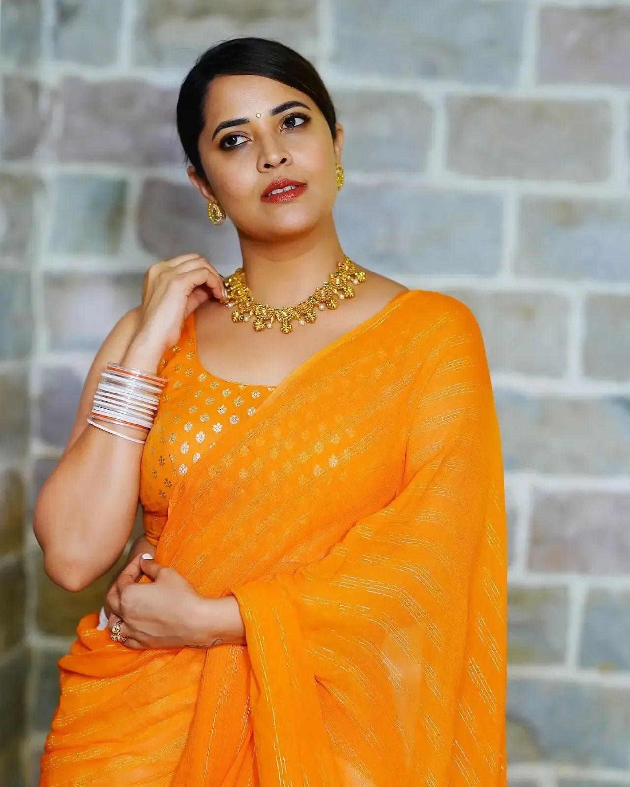 INDIAN ACTRESS ANASUYA BHARADWAJ IMAGES IN YELLOW LEHENGA CHOLI 2